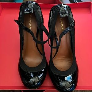 Black patent leather Mary Jane shoes.